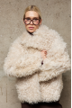 Short reversible sheepskin jacket made of natural sheepskin in light beige color